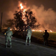 Soldiers survey the scene of a massive gas explosion in Tlahuelilpan, Hidalgo state, Mexico, on Jan. 18, 2019.